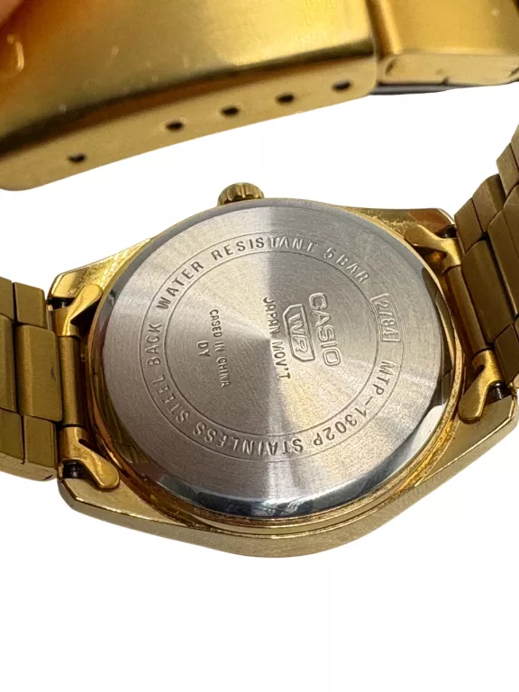 zegarek-casio-mtp-1302p-zielona-tarcza-ksztalt-koperty-129223-2