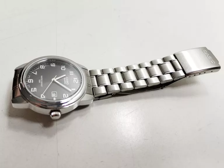 stalowy-klasyczny-zegarek-casio-mtp-1221-stan-11323-2