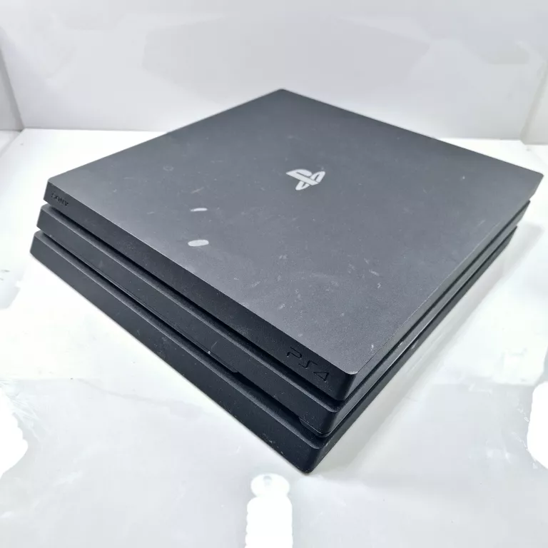 konsola-ps4-pro-1tb-pad-cuh-7016b-03-27452400-7115678-stan-11323-2