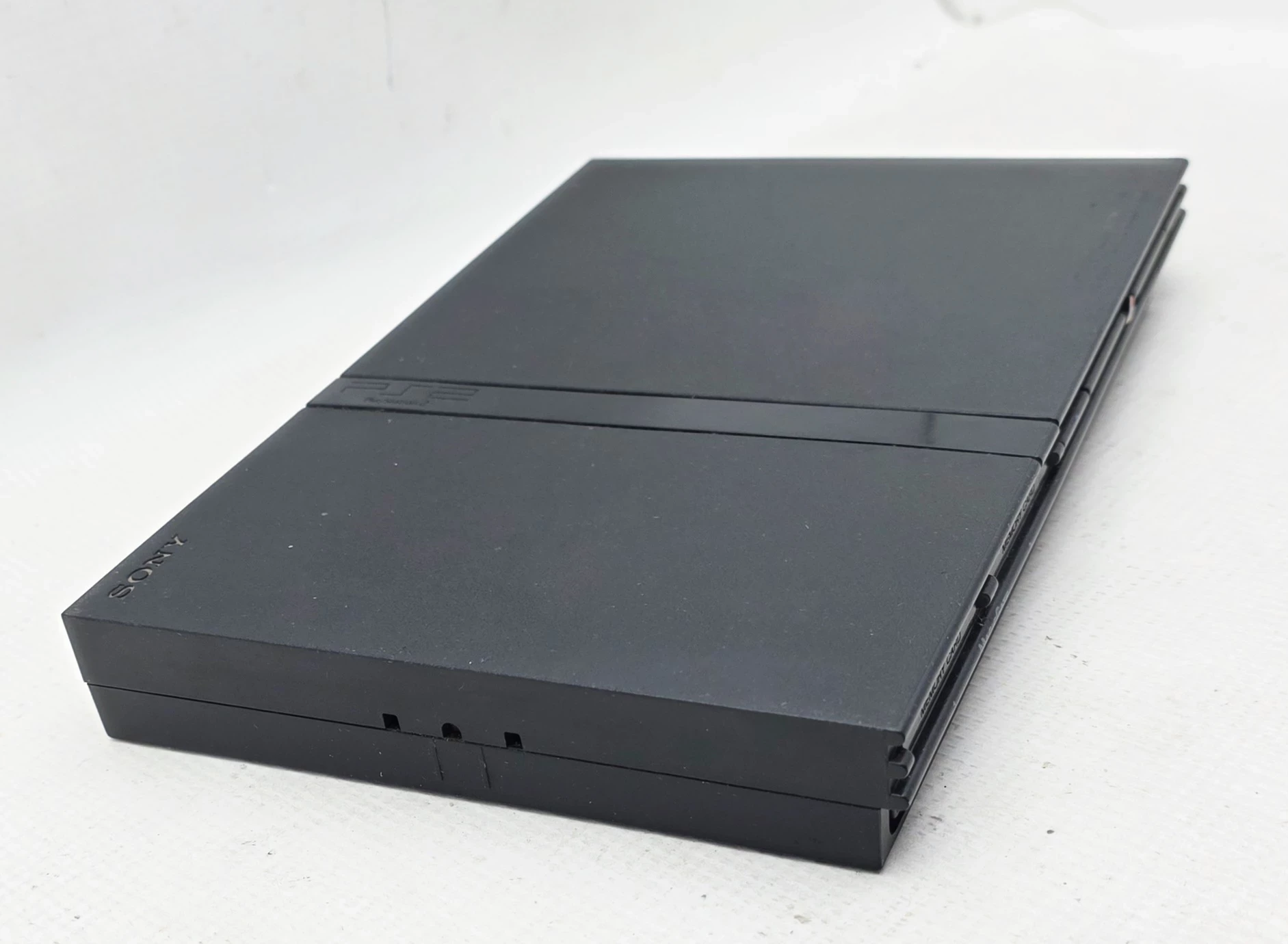 konsola-ps2-slim-scph-77004-zasilacz-pad-na-czesci-producent-248914-1705040