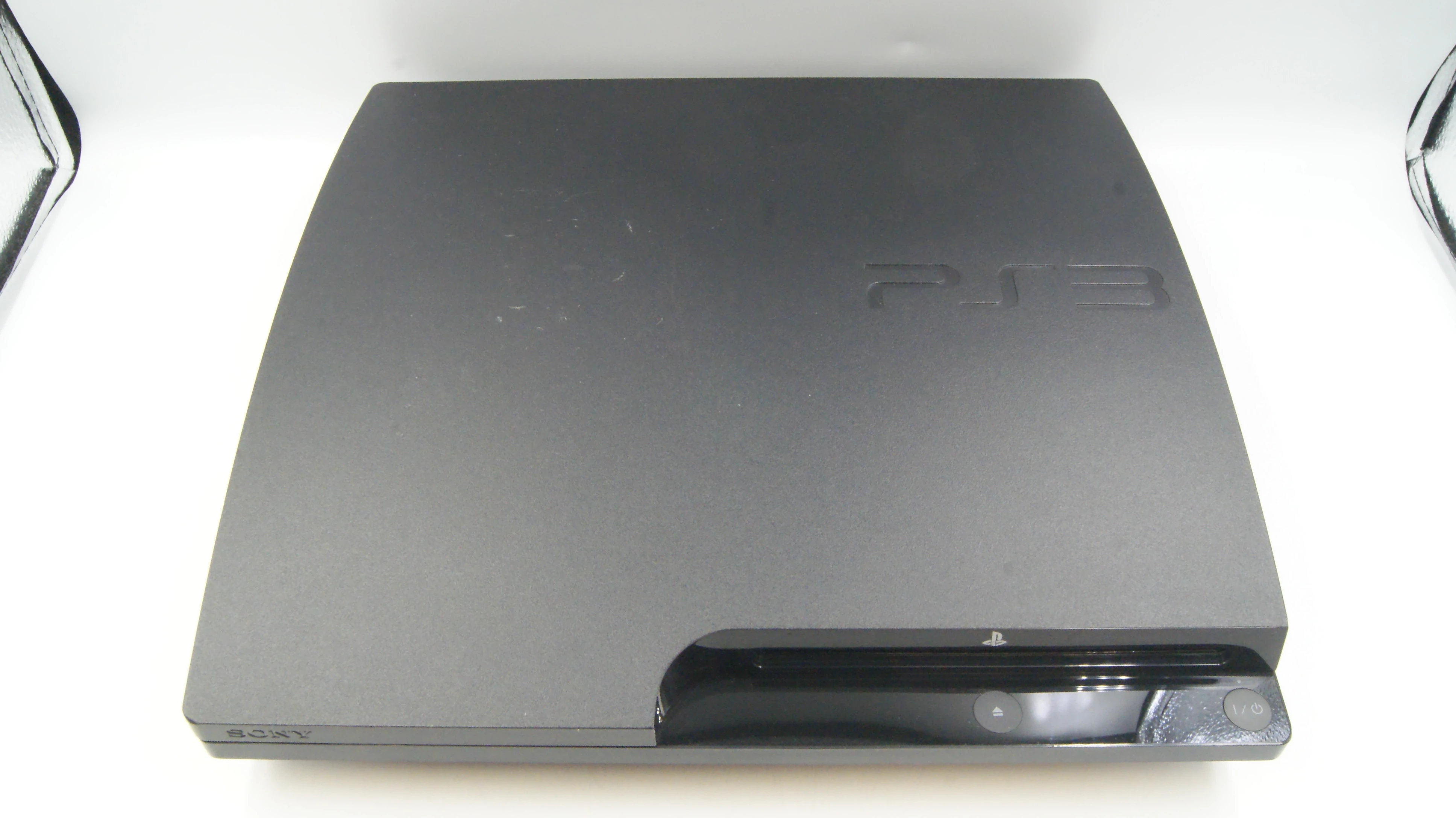 konsola-playstation-3-slim-320gb-oryginalny-pad-3-gry-ps3-stan-11323-2