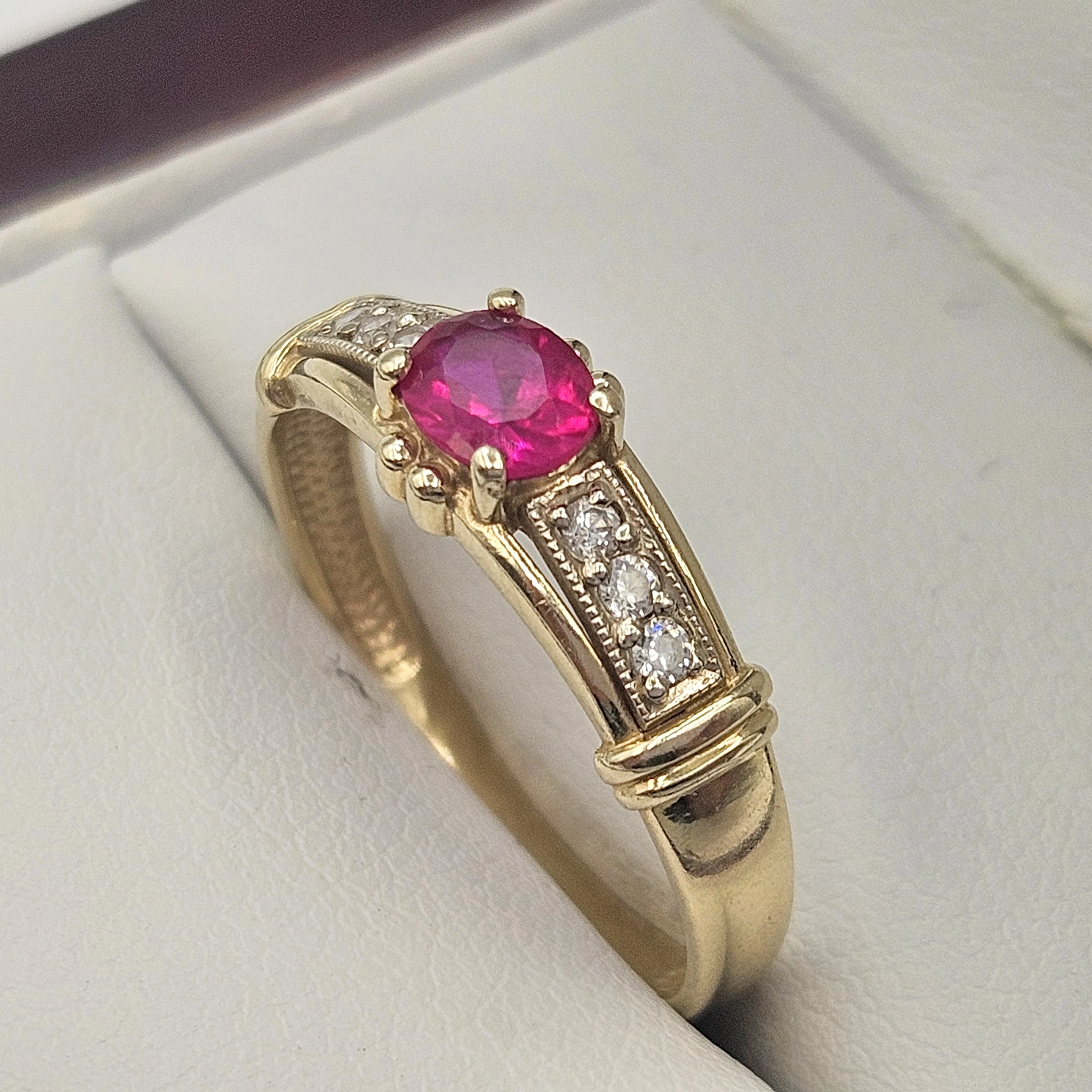 zloty-pierscionek-z-rozowym-oczkiem-585-221g-r16-waga-993