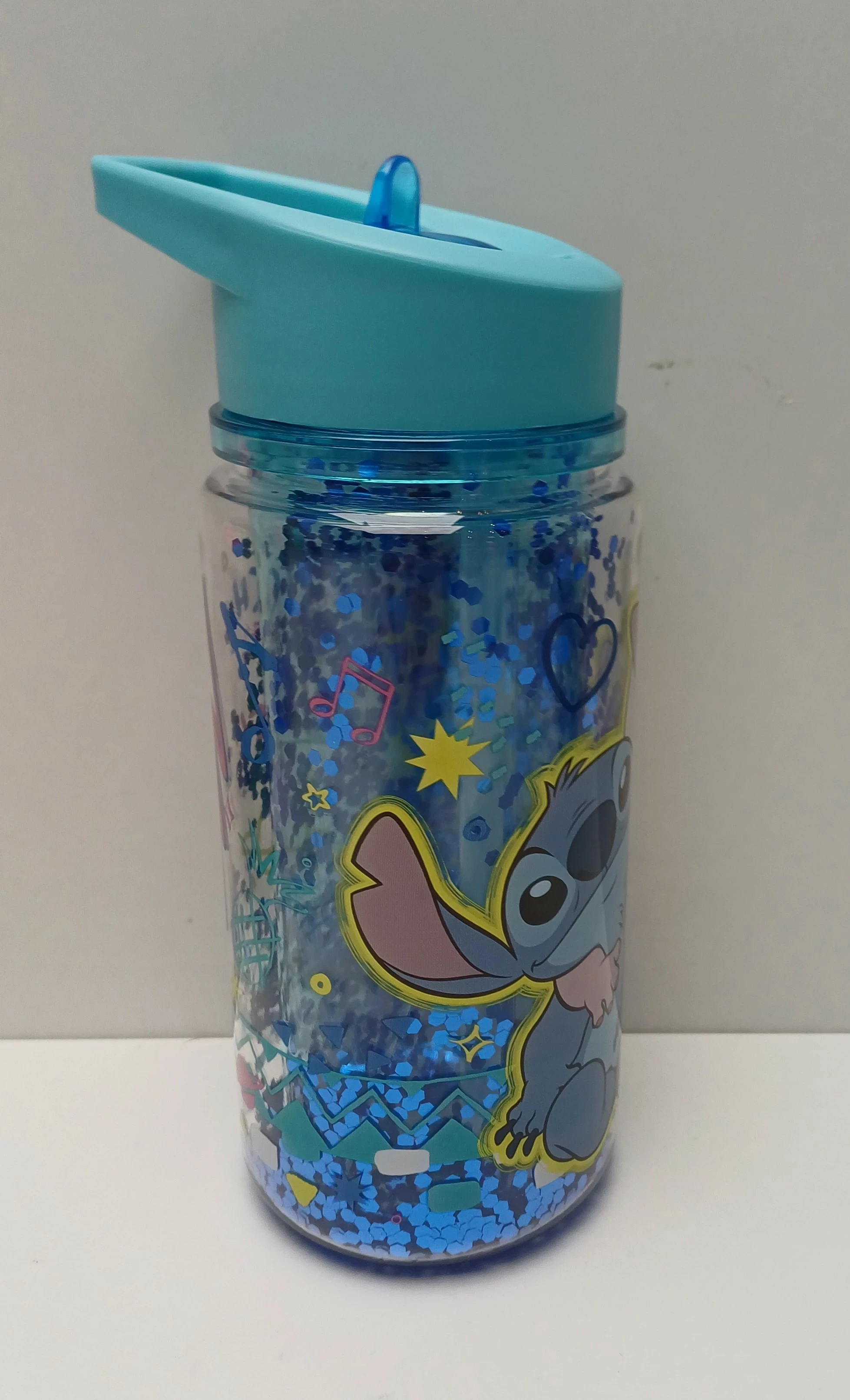 bidon-plastikowy-stitch-i-angel-z-brokatem-300ml-ean-gtin-8412497955022