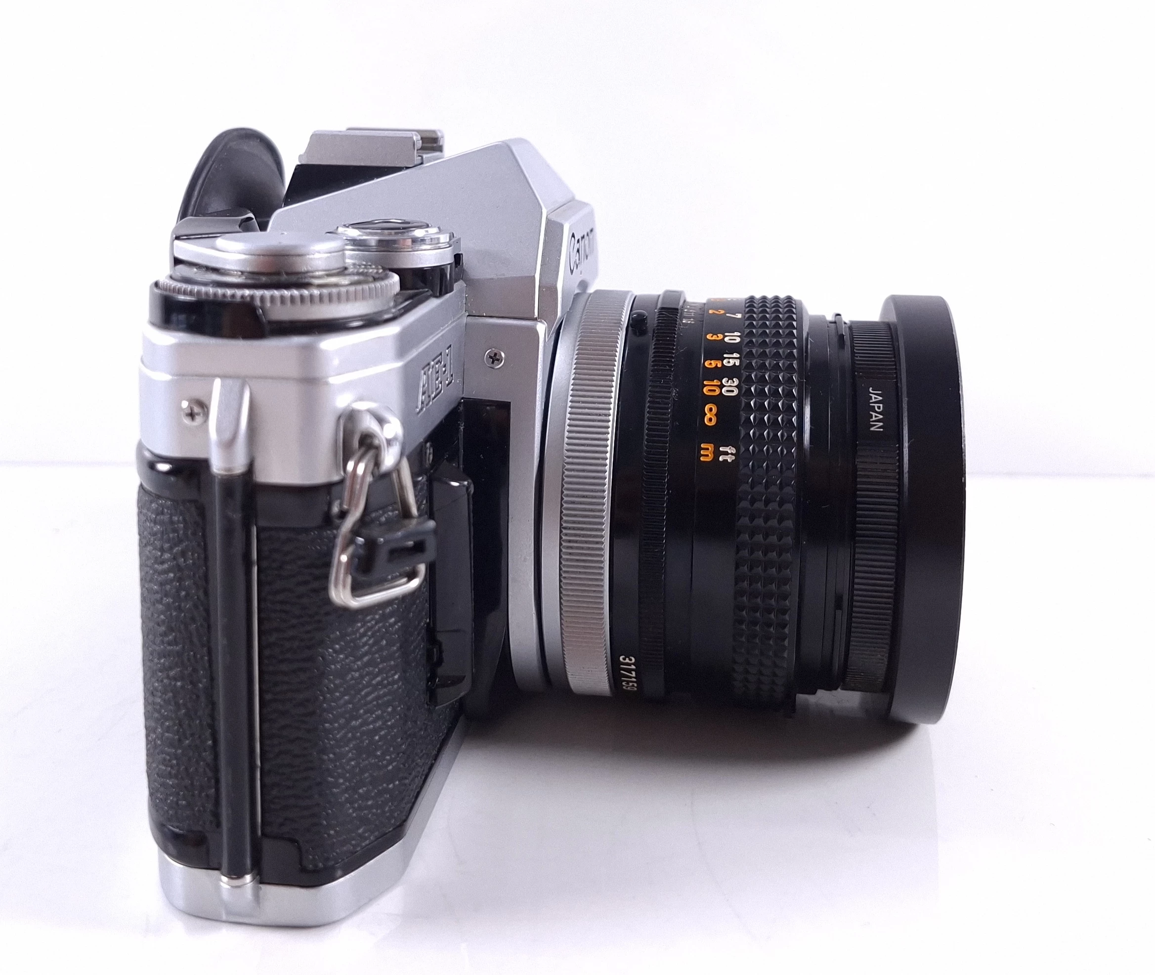 aparat-analogowy-canon-ae-1-obiektyw-marka-248811-1949762