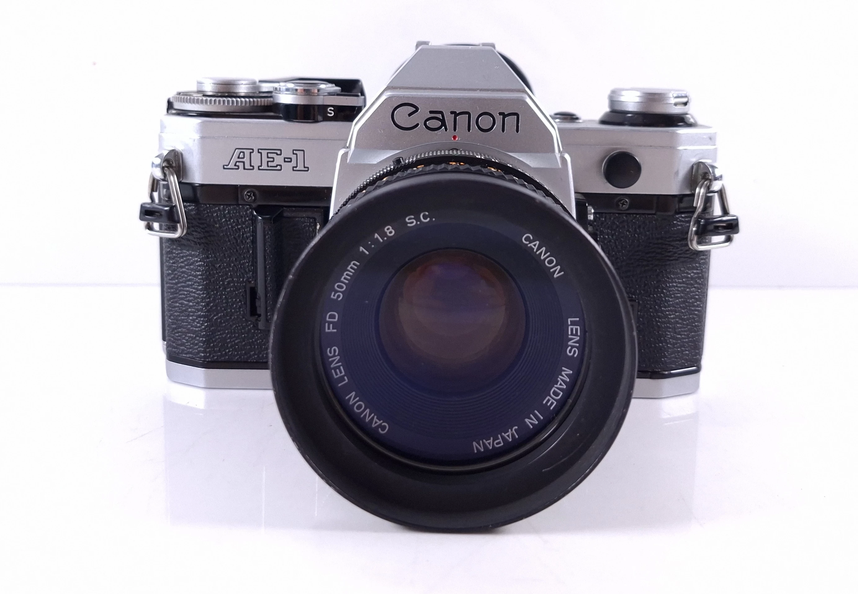 aparat-analogowy-canon-ae-1-obiektyw-glogowska-66-poznan-ska-x