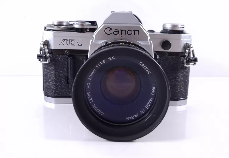 aparat-analogowy-canon-ae-1-obiektyw-glogowska-66-poznan-ska-x