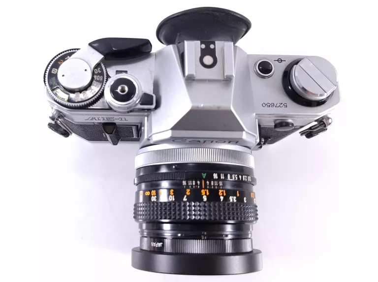 aparat-analogowy-canon-ae-1-obiektyw-zawiera-baterie-250685-2006717