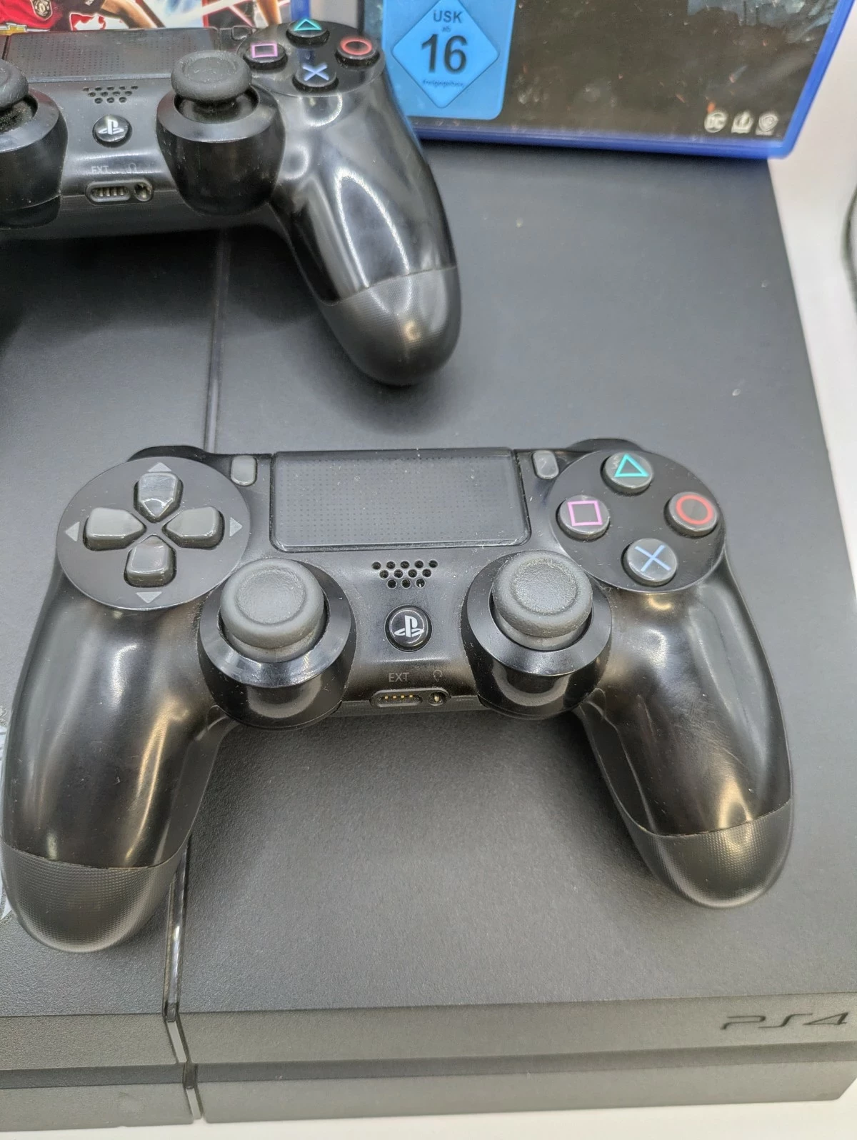 konsola-ps4-1tb-2-pady-1-driftujace-analogi-2-gry-ean-gtin-711719757313