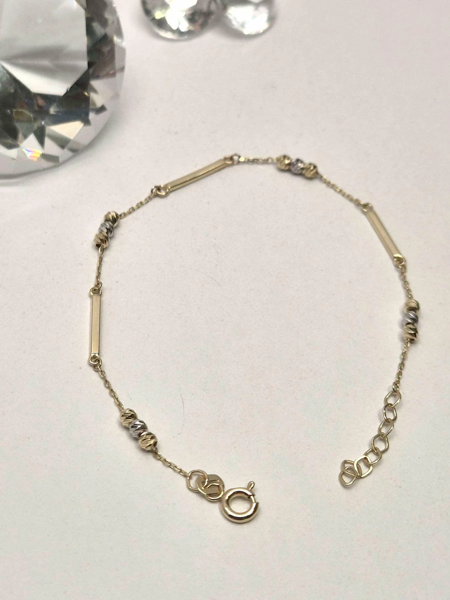 zlota-damska-bransoletka-585158g-okulickiego-50a-radom