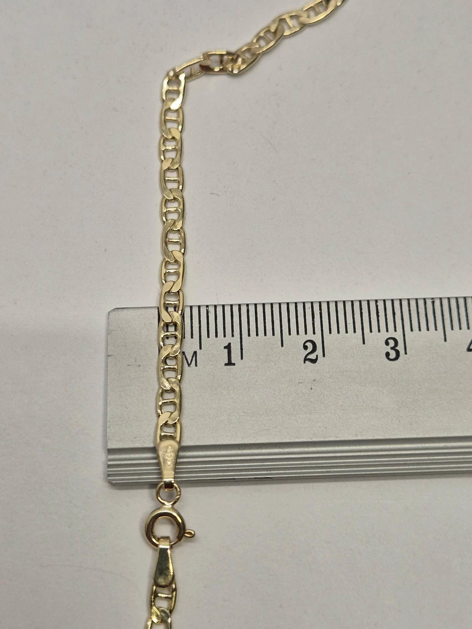 zloty-lancuszek-585367g-gucci-material-17128-2