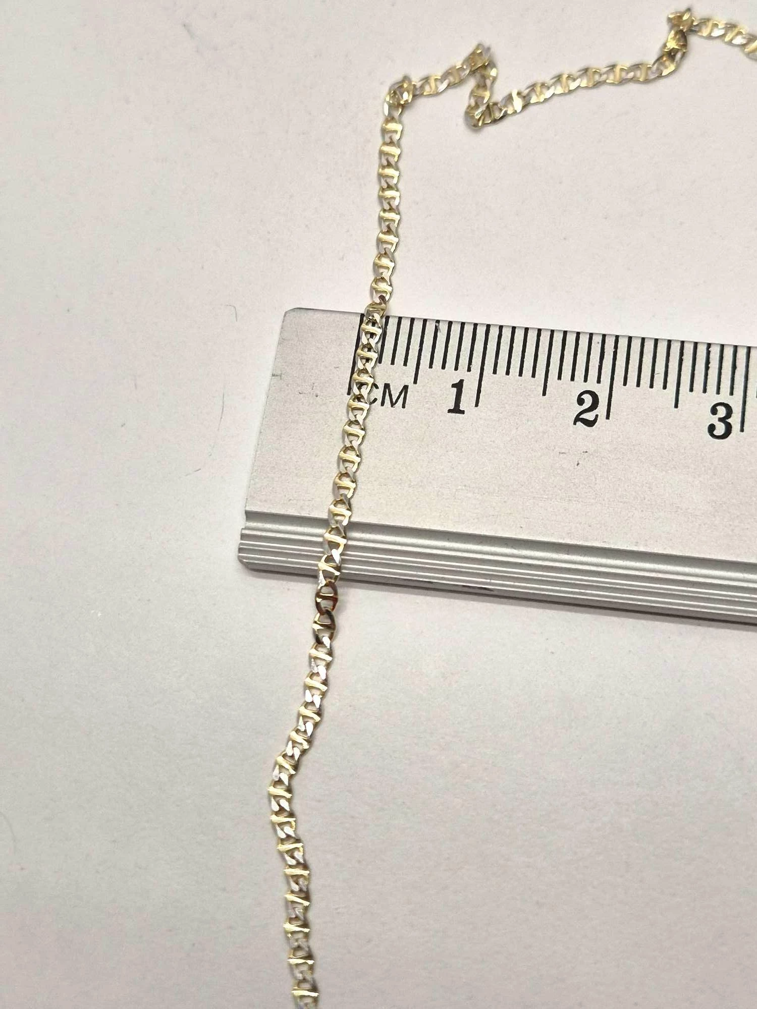 zloty-lancuszek-585237g-gucci-material-15835-2