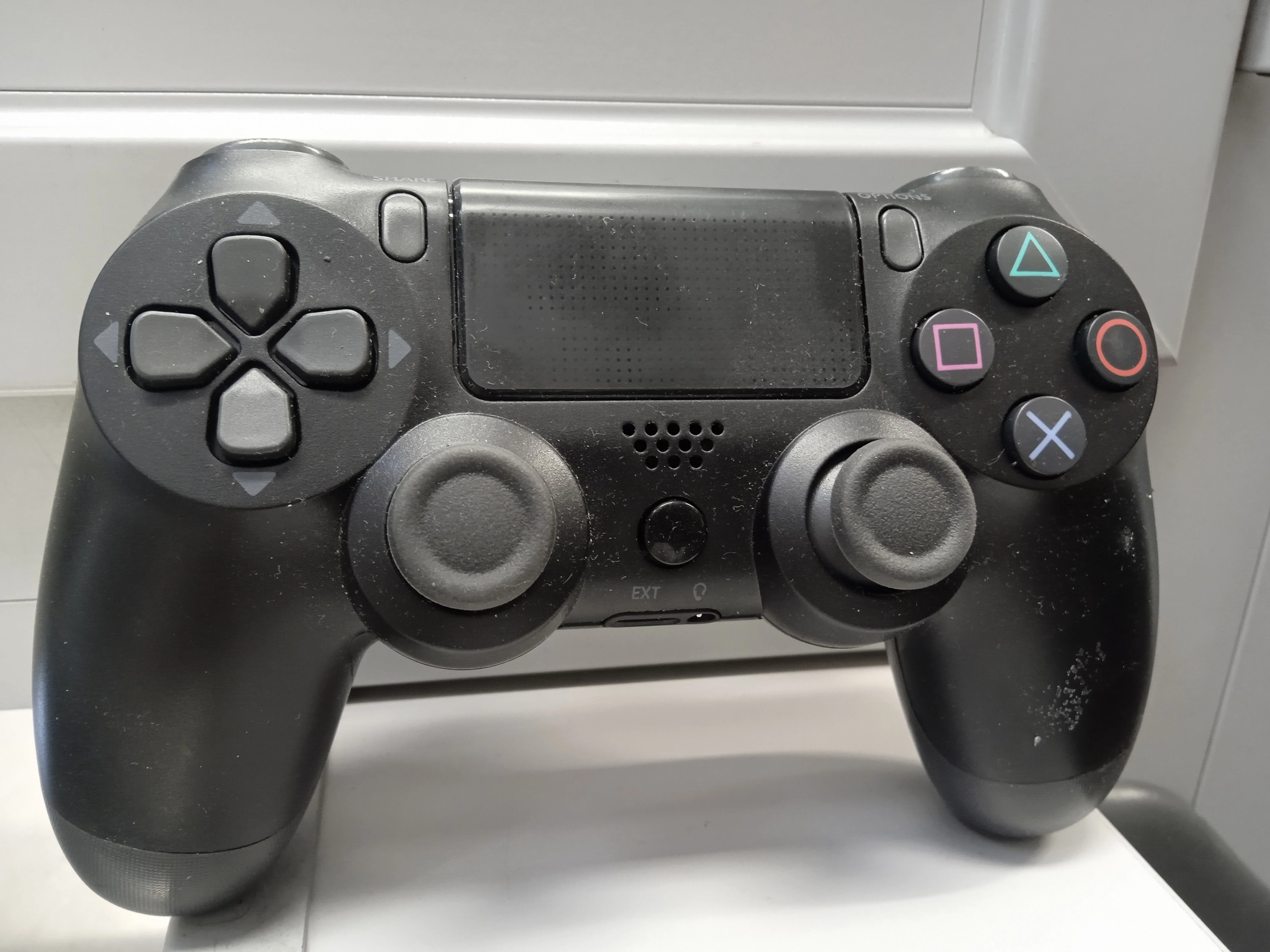 pad-bezprzewodowy-do-ps4-sony-czarny-krotka-2u-sj-olawa