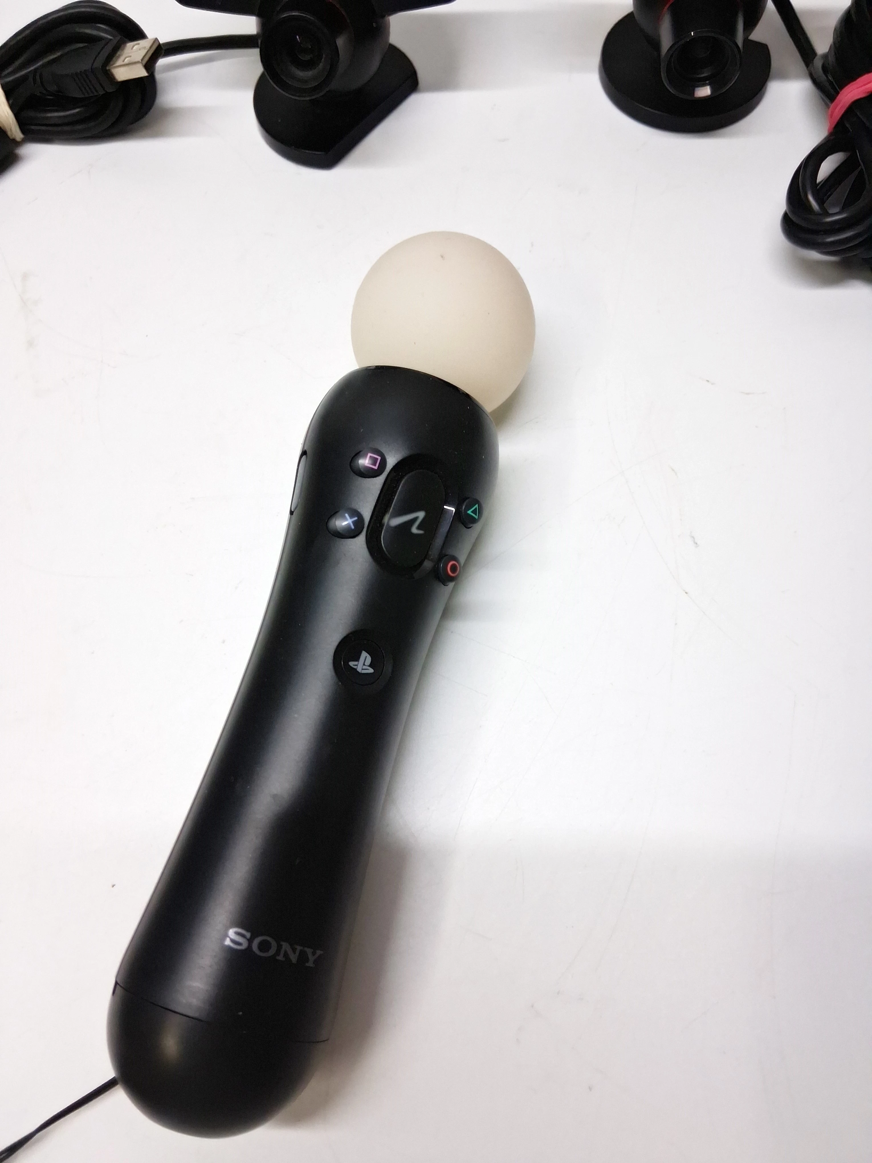 zestaw-dwoch-kontrolerow-sony-playstation-move-cech-zcm1e-z-kamera-zawiera-baterie-250685-2006716