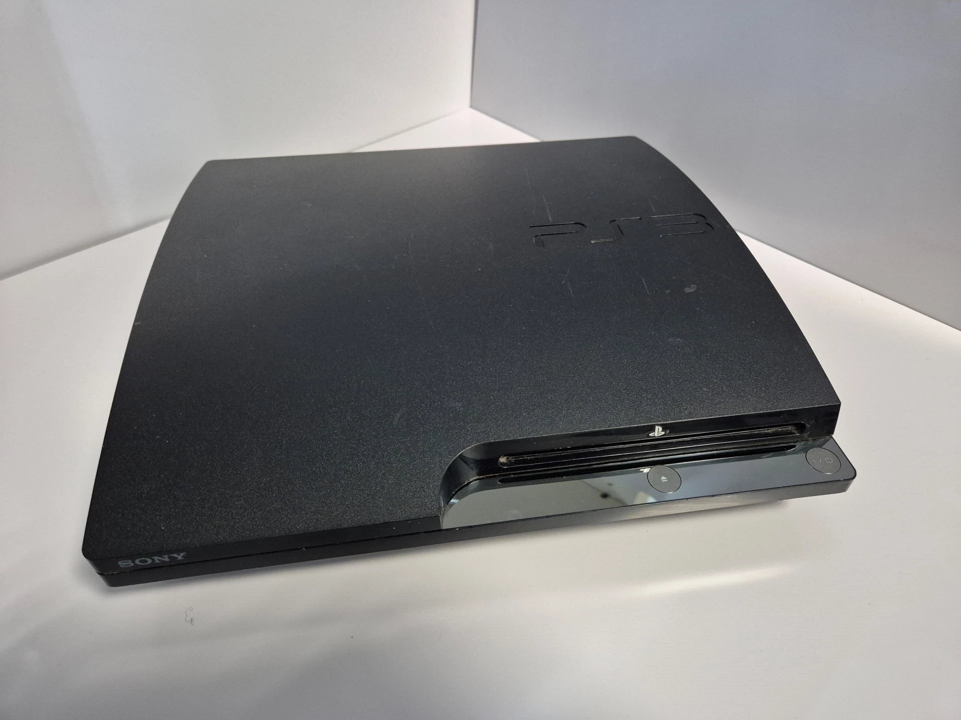 konsola-sony-ps3-slim-11-gier-320gb-pad-z-napedem-sprawna-kod-producenta-ps3