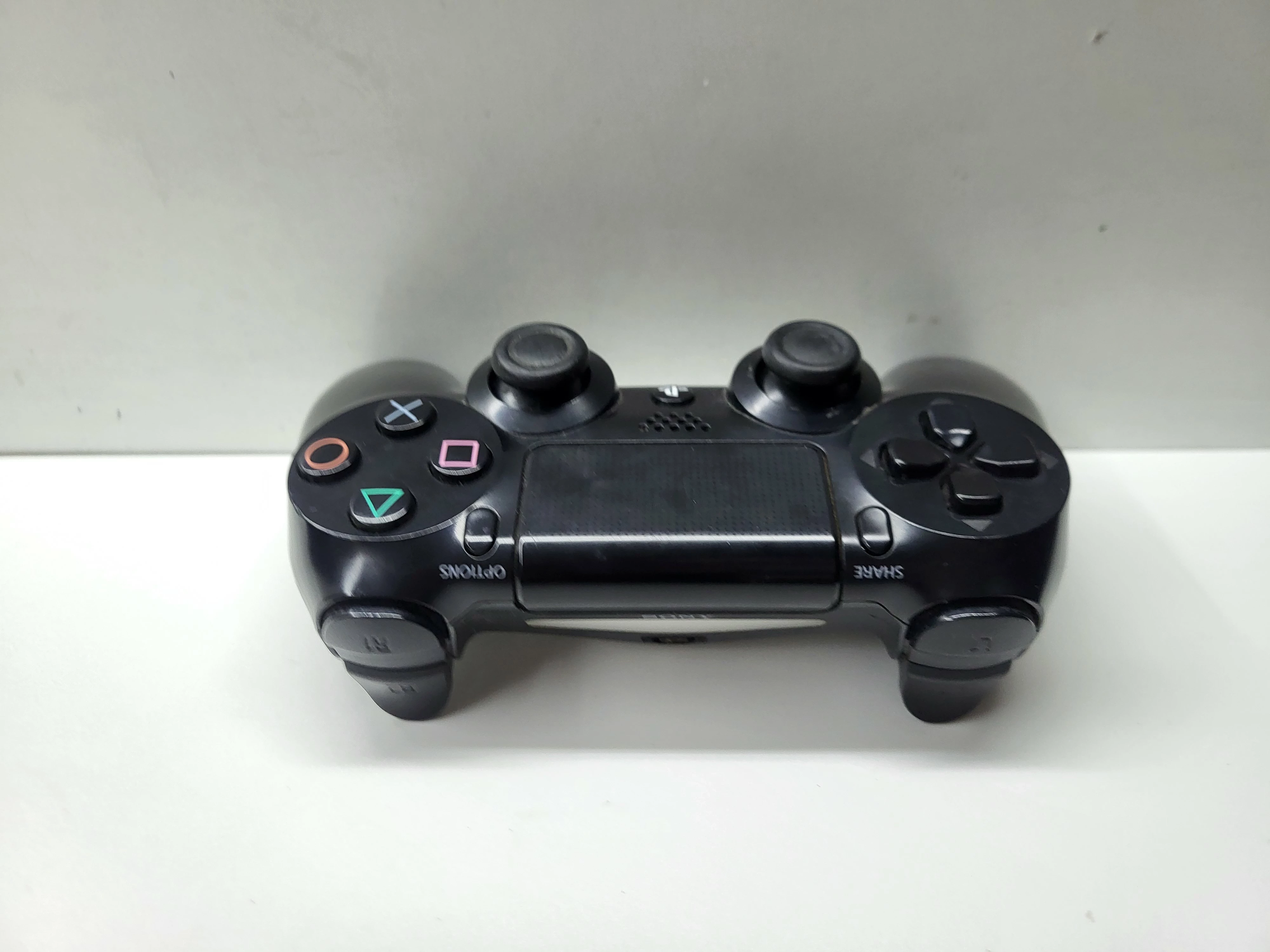 pad-do-ps4-czarny-pochodzenie-210658-243450