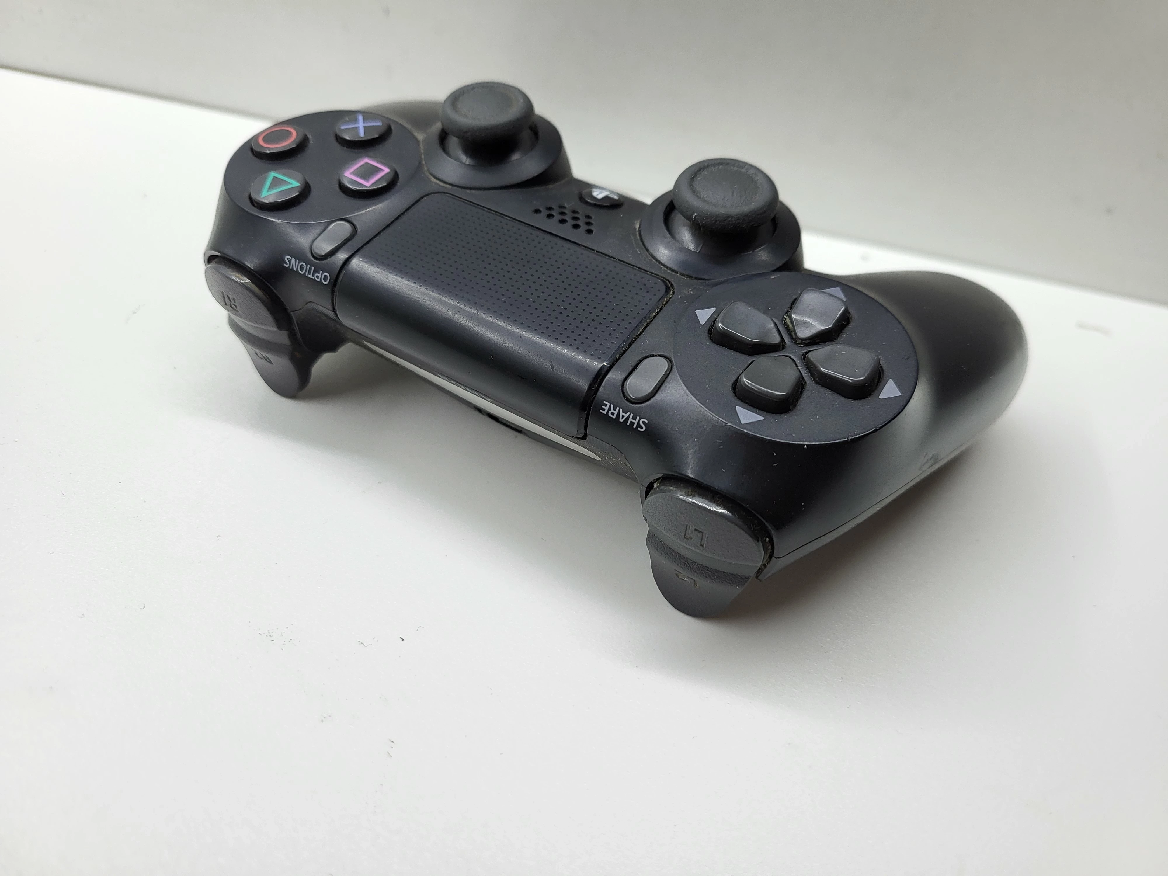 pad-do-ps4-czarny-pochodzenie-210658-243450