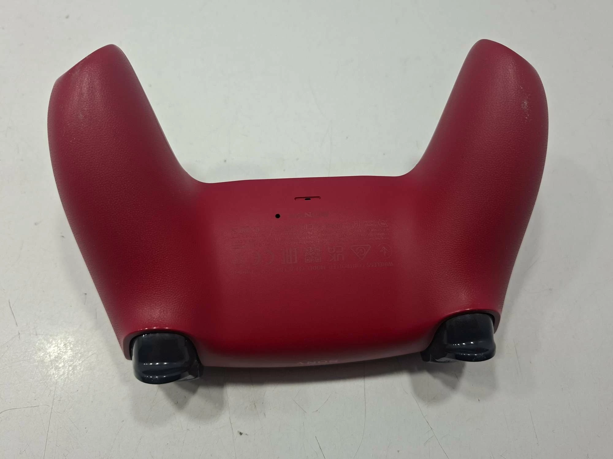 pad-do-sony-ps5-czerwonybordowy-stan-11323-2