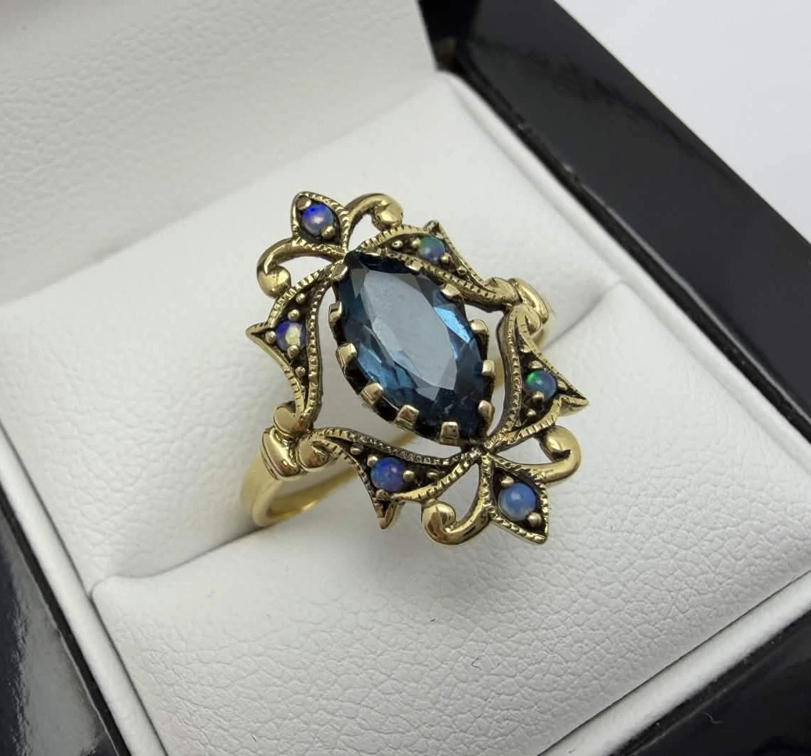 zloty-pierscionek-z-topazem-i-opalami-585-279g-r19-sw-katarzyny-4-torun