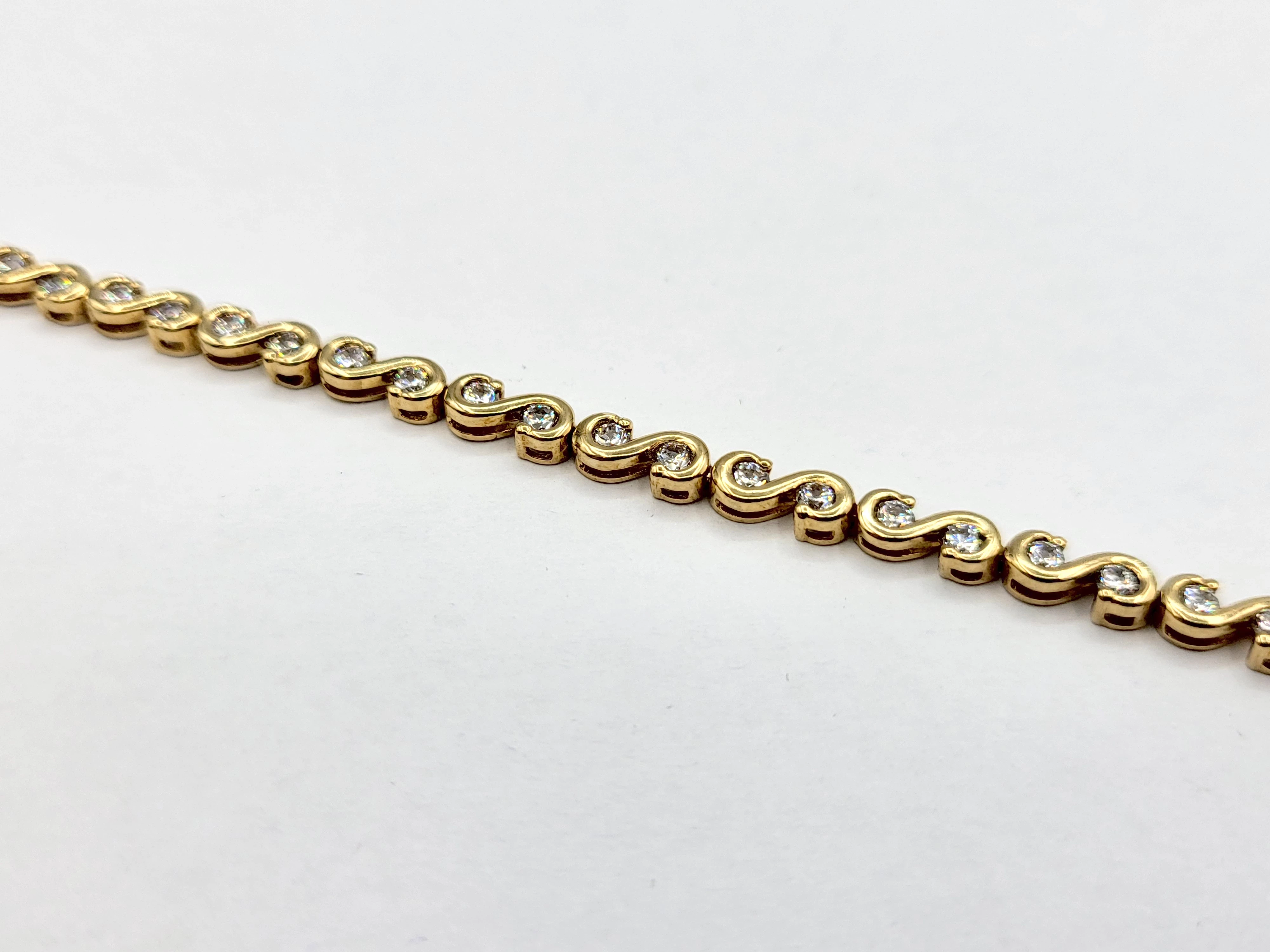 nienoszona-zlota-bransoletka-z-cyrkoniami-375-744g-19cm-ean-gtin-8711252472607