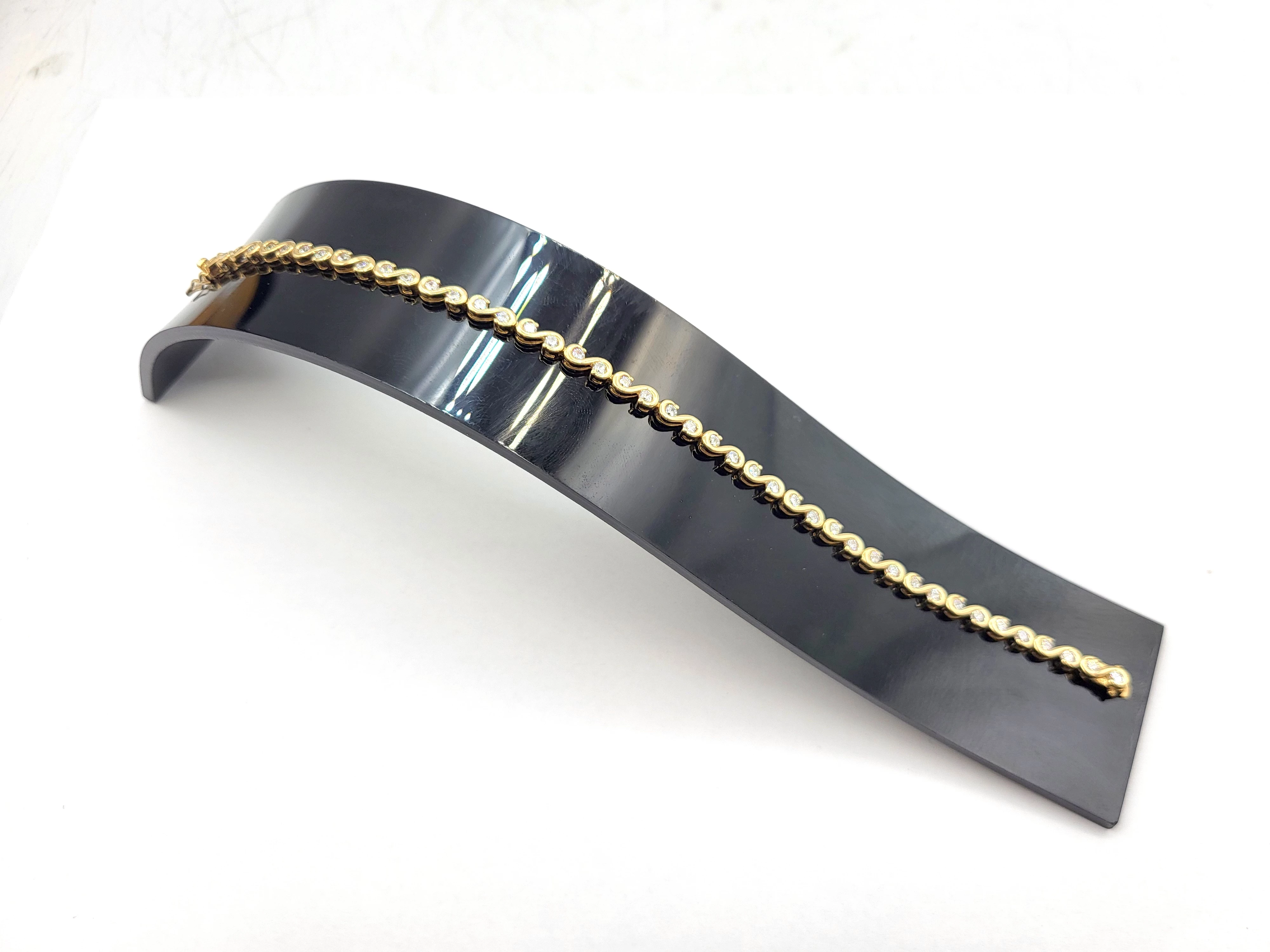 nienoszona-zlota-bransoletka-z-cyrkoniami-375-744g-19cm-material-15835-2